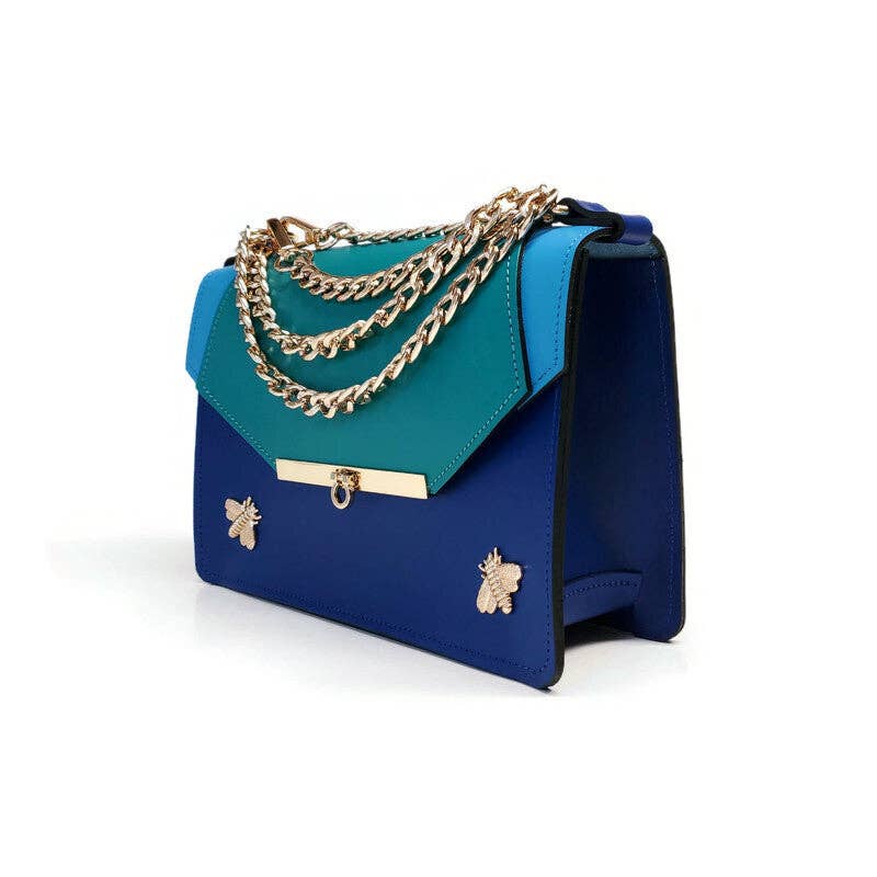 gavi shoulder handbag has three colors of blue, a gold chain and two pale gold bee accents
