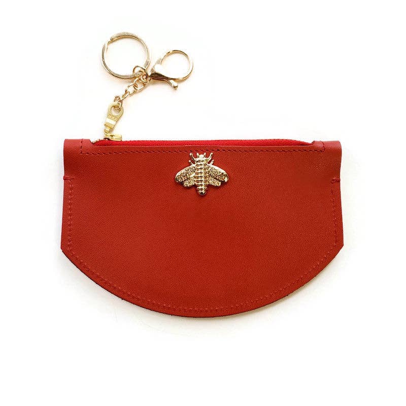 red wallet with zip closure and bee detail in red
