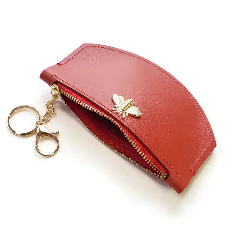 bee wallet with zip closure shown open in red color
