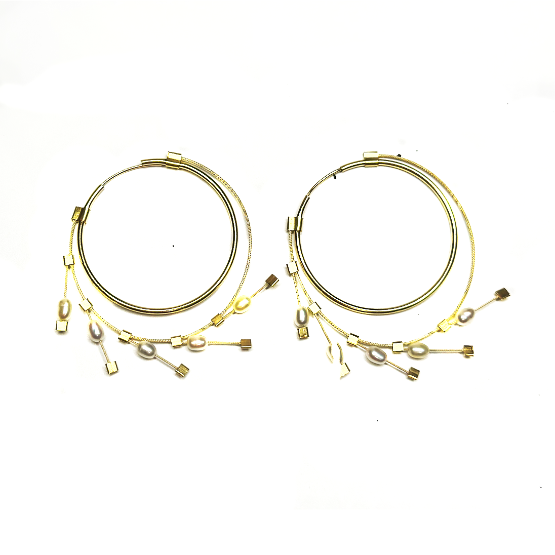 Gold wire earrings with pearls that look like a continual hoop through your ear.