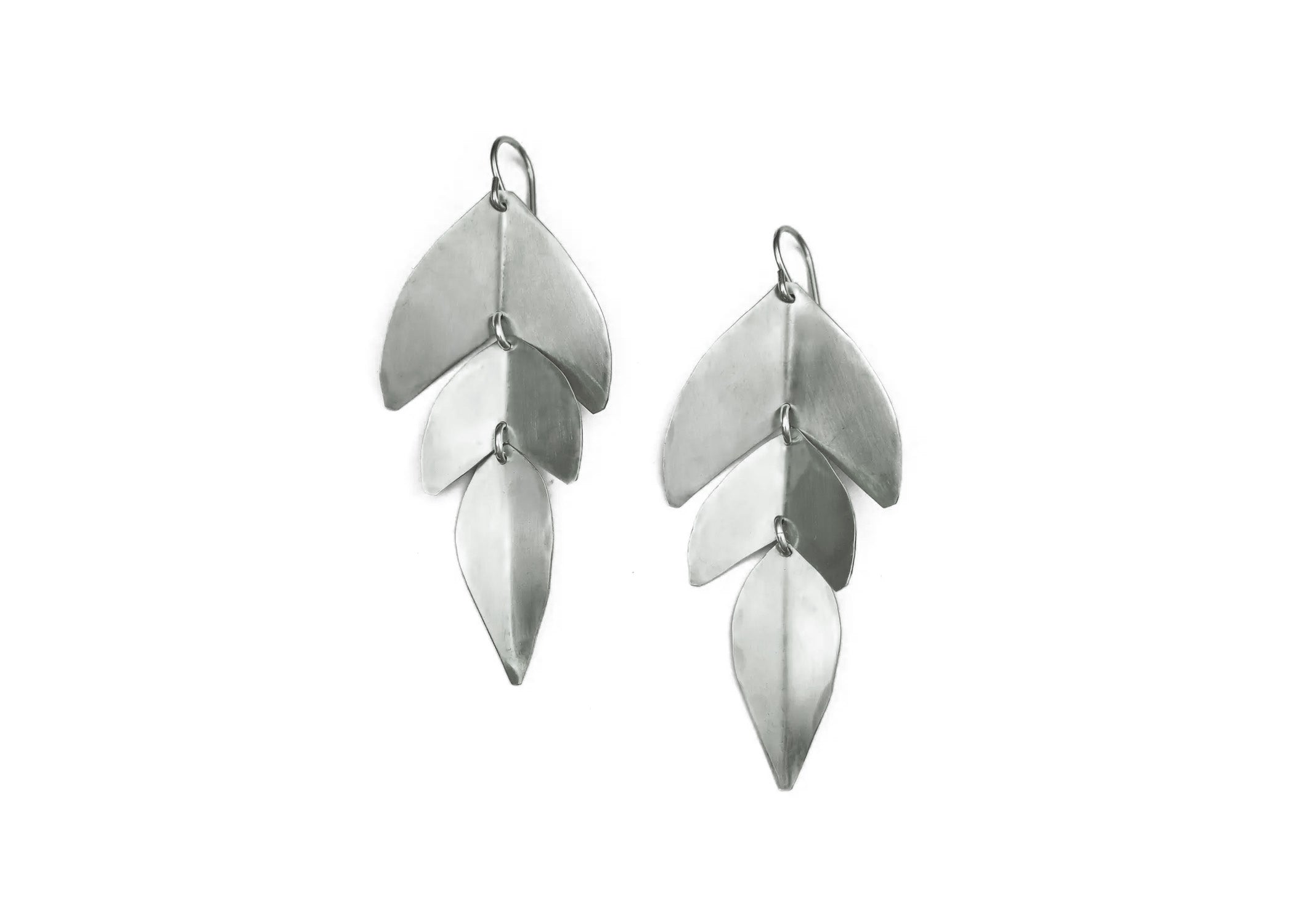 silver earrings with three levels that look like sage leaves