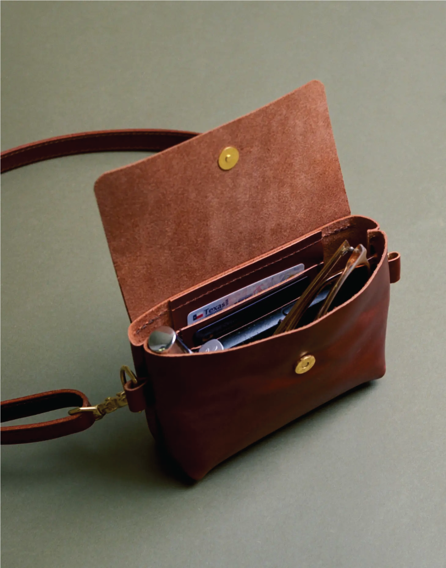 Brown leather small cross body bag; open view