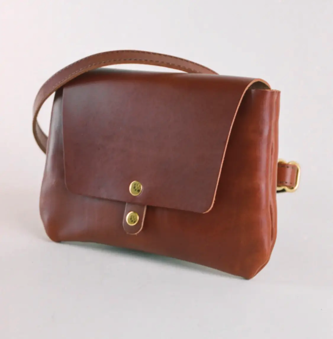 Brown hip satchel, closed view